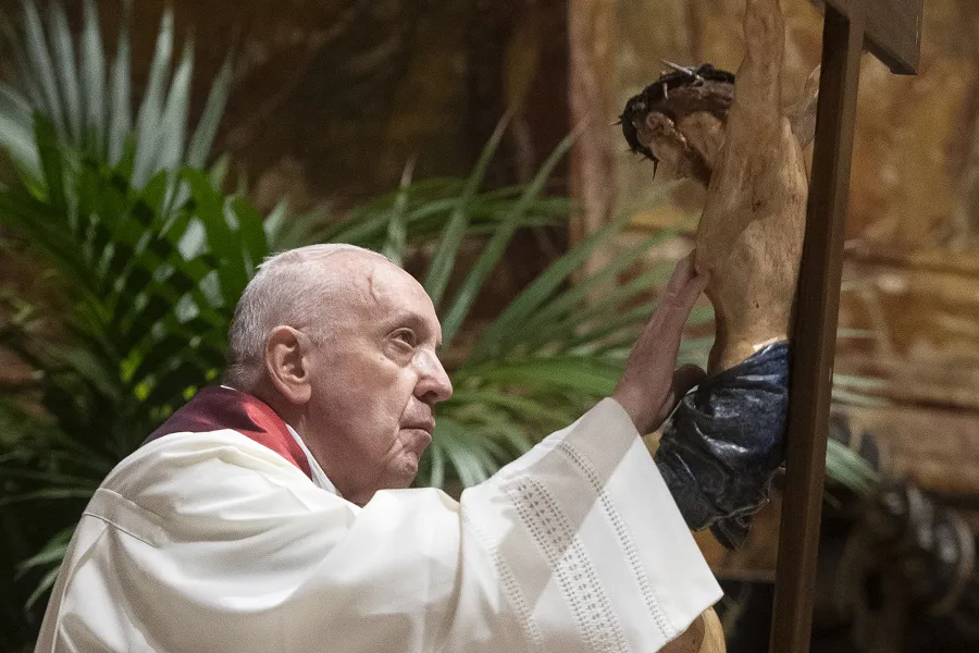 Pope Francis adores the crucifix during the Good Friday liturgy at St. Peter's Basilica April 2, 2021.?w=200&h=150